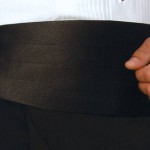 Fusciacca da smoking. utilizzata per nascondere il punto dove la camicia si infila nel pantalone.