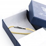 Bracciale in pelle Skin Giallo L'Avvocato nella sua confezione