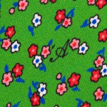 Cravatta Sette Pieghe Marella Verde Pastello Scuro - dettaglio della microfantasia floreale con monogramma